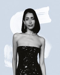 Zion Moreno poses in a glitterly black evening dress